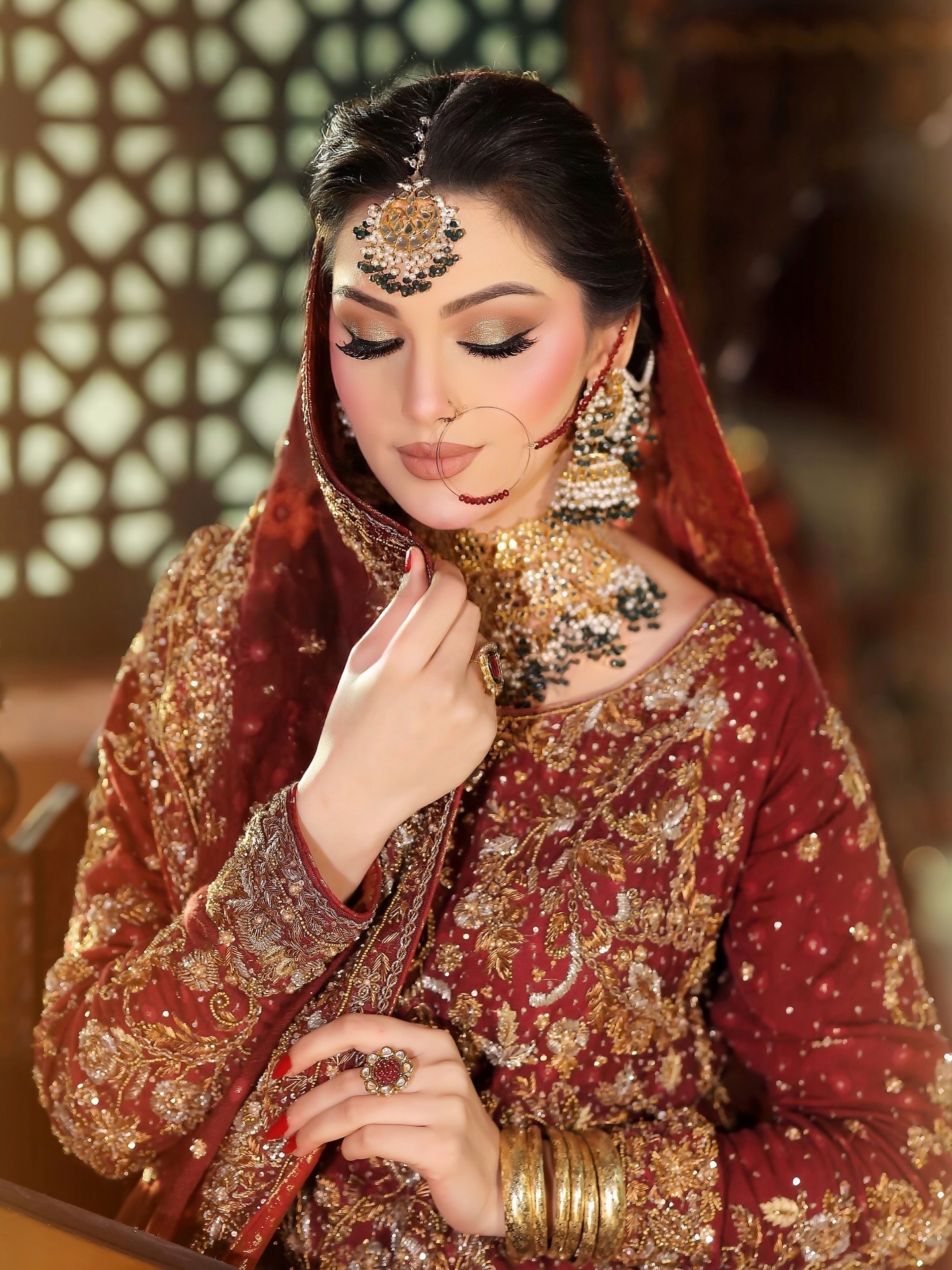 Bride in red with polished makeup