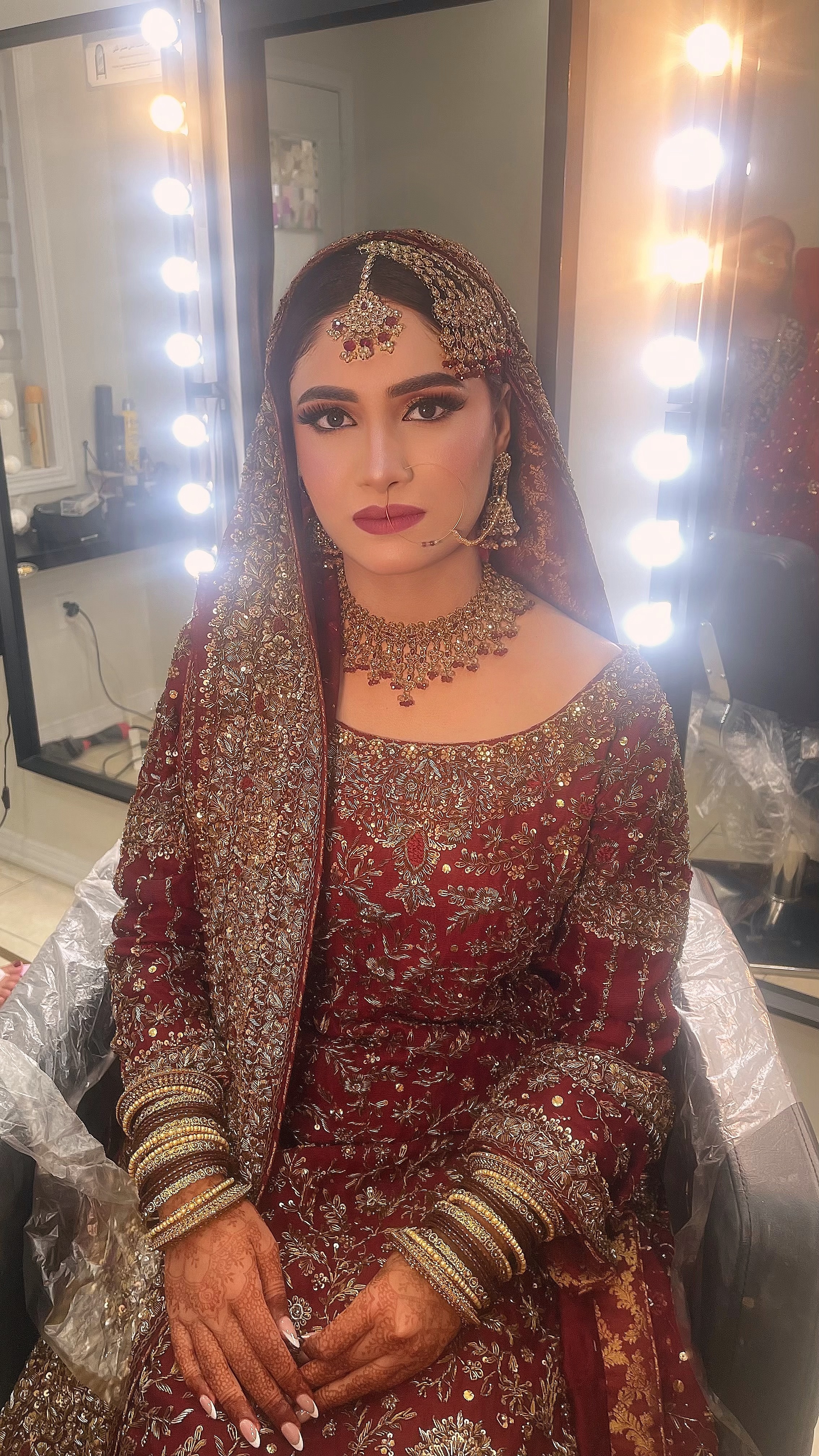 Bride in the studio after makeup and styling