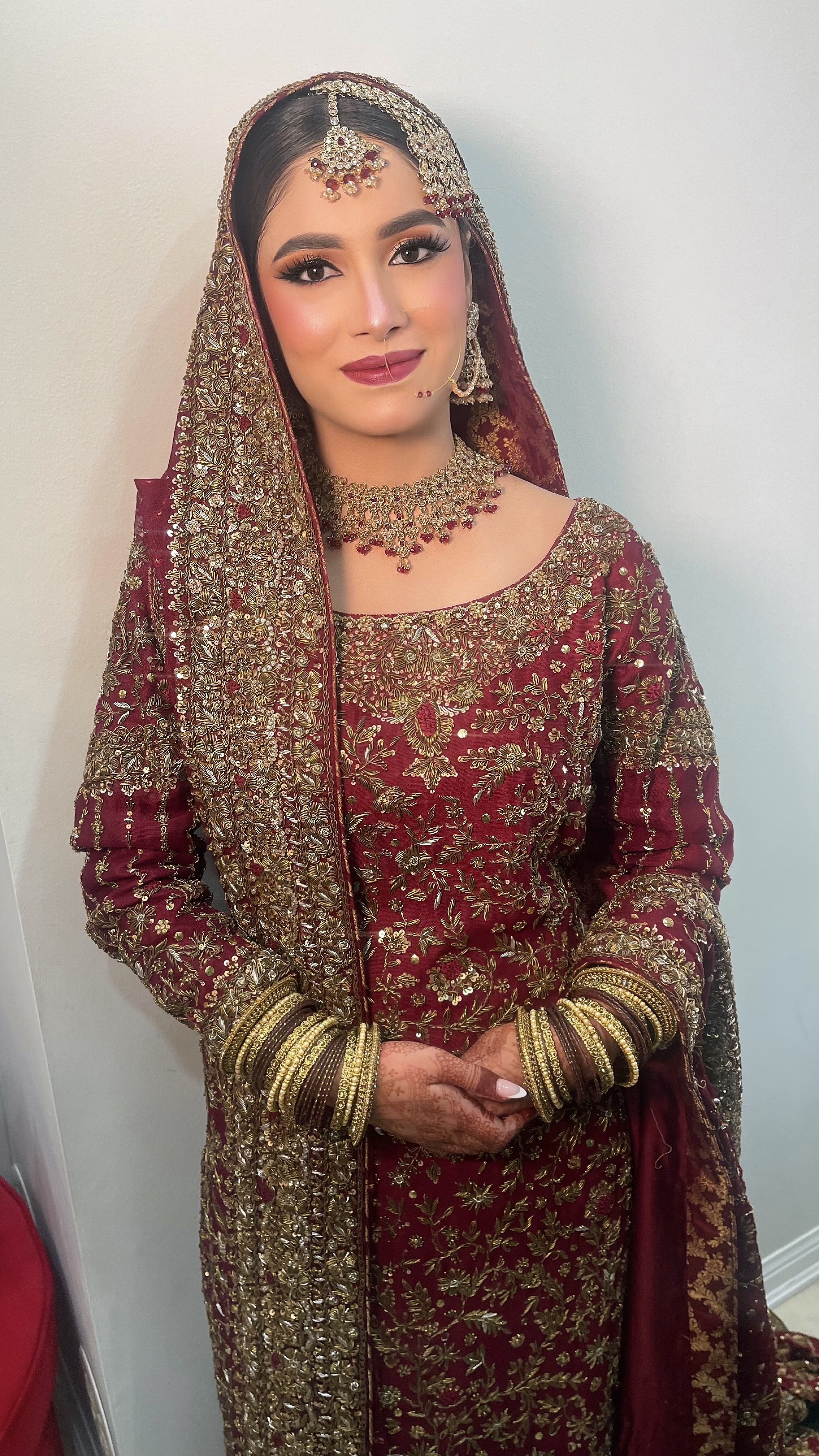 Finished maroon bridal makeup and styling